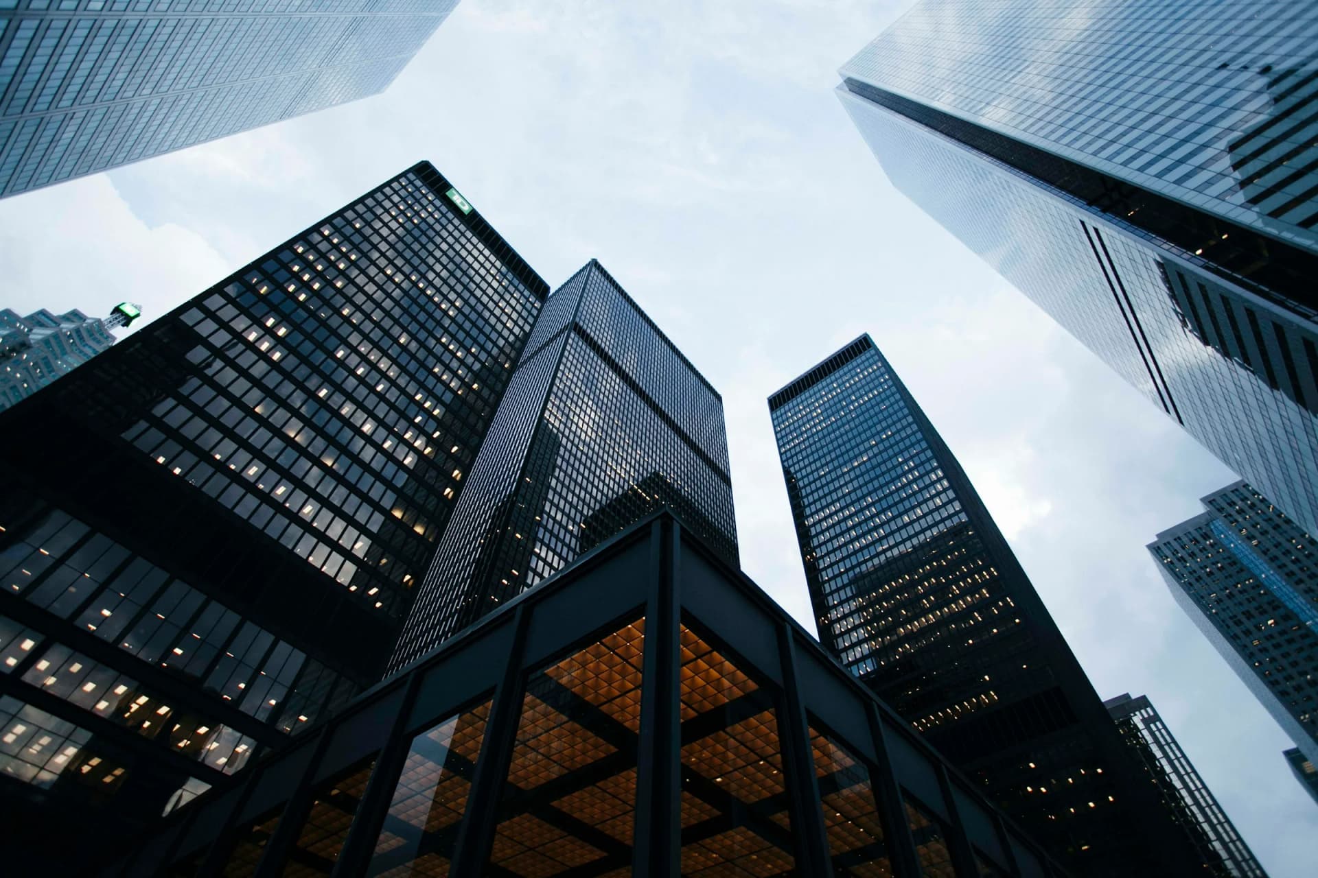 Modern glass office towers viewed from below